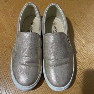 Metallic gold sneakers